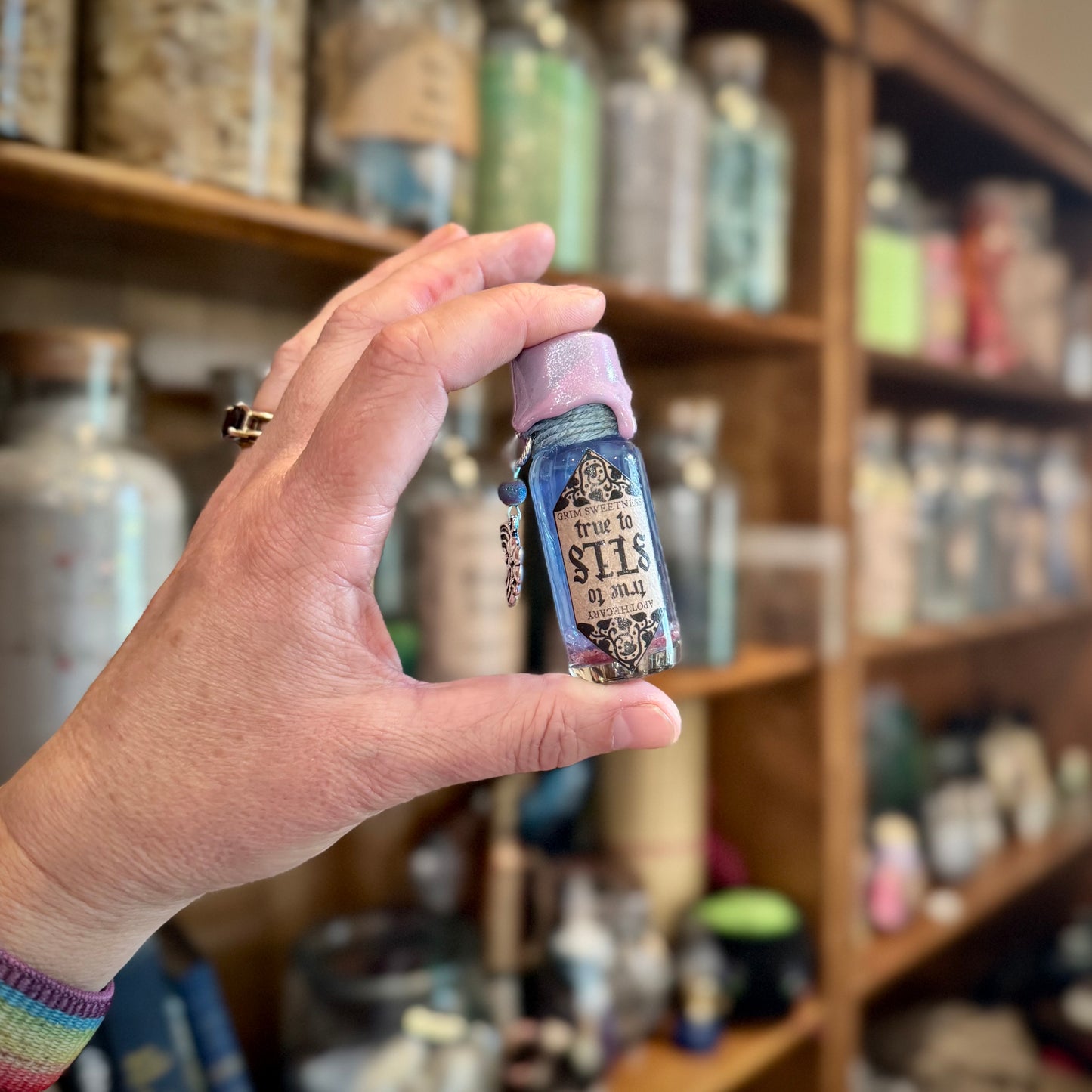 True to Self, A Blue to Pink Color Change Mini Potion Bottle Fidget