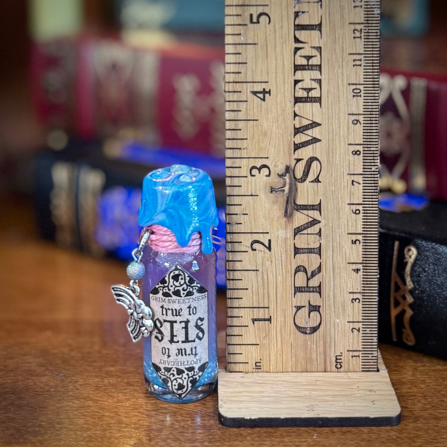 True to Self, A Pink to Blue Color Change Mini Potion Bottle Fidget