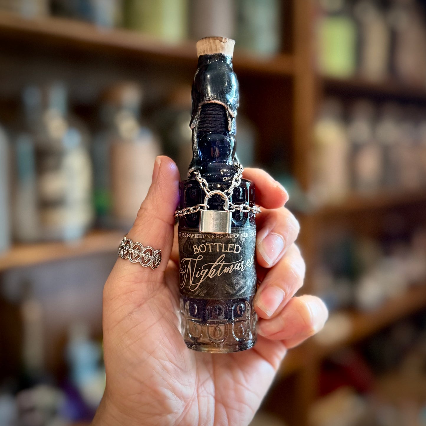 Small Bottled Nightmares, A Swirling Night Sky Potion Bottle Prop