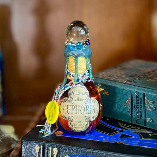 Elixir to Induce Euphoria, A Color Changing Potion Bottle Prop