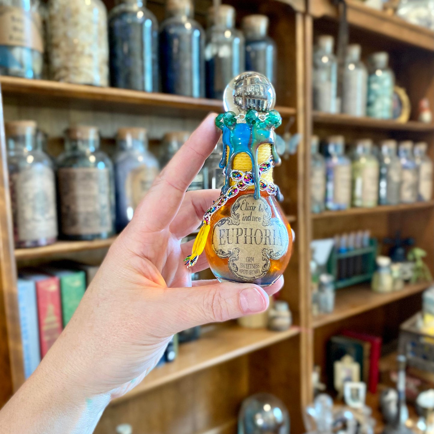 Elixir to Induce Euphoria, A Color Changing Potion Bottle Prop